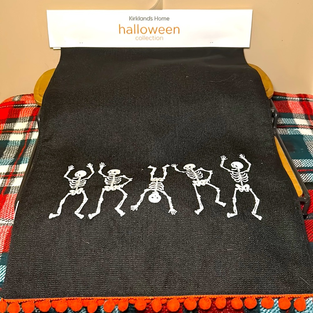 Table runner with dancing skeletons